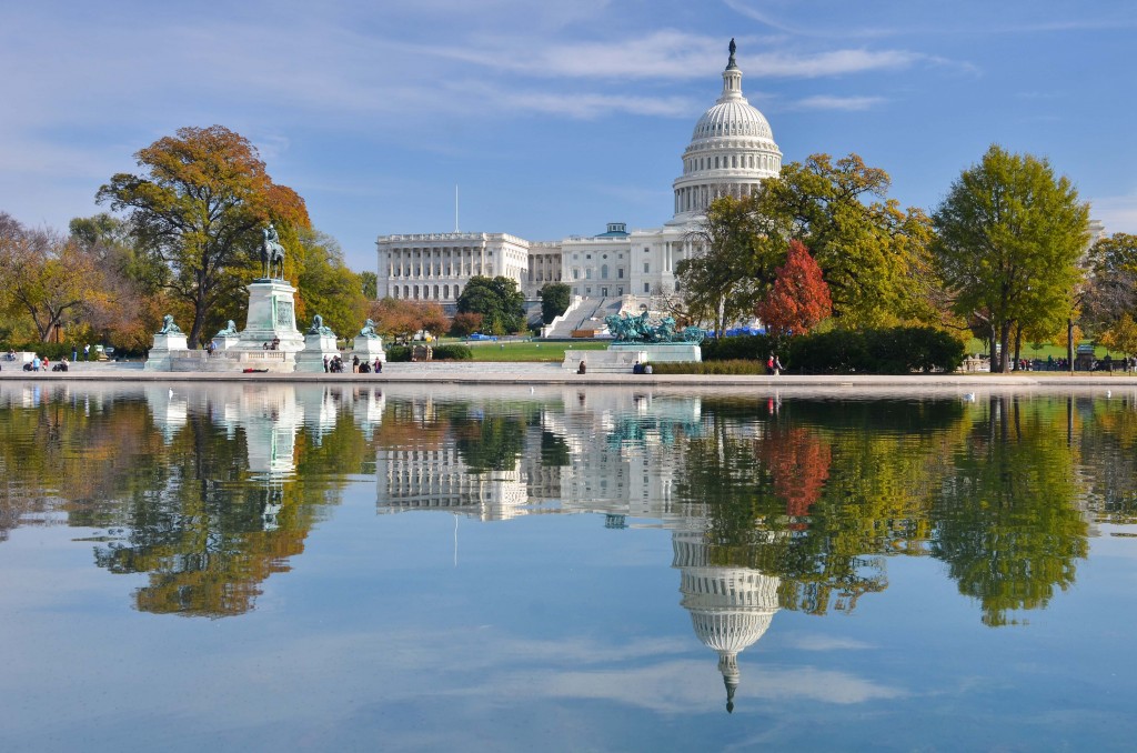 Washington DC, US Capitol Building and mirror reflection in autumn